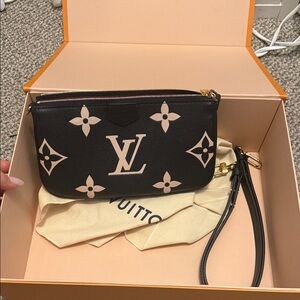 Louis Vuitton Black and Pink Clutch brand new never used